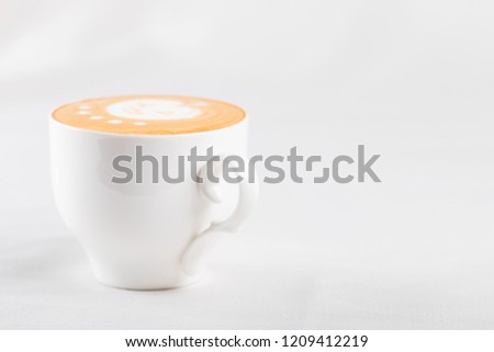 Halloween coffee drink with pumpkin picture on a white background