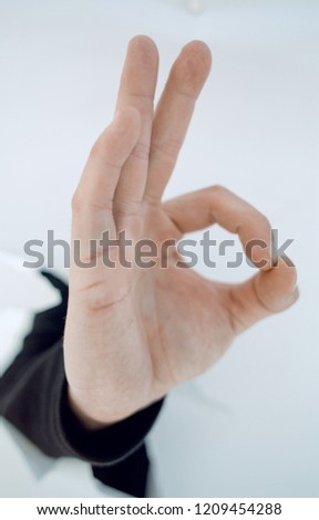 image of hand businessman showing OK gesture