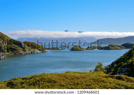 Landscape of a large fjord with small green islands on the Nordic sea, Lofoten islands, norway.