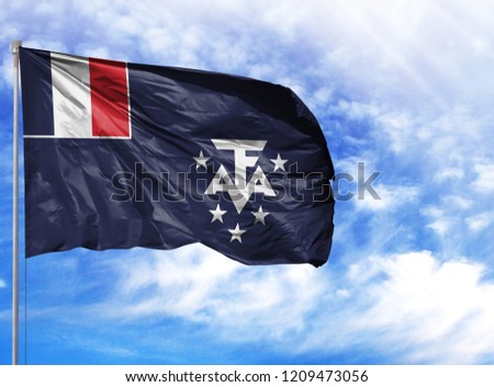 National flag of French Southern and Antarctic Lands on a flagpole