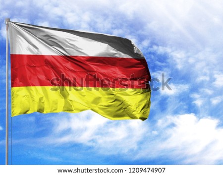 National flag of South Ossetia on a flagpole