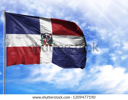 National flag of Dominican Republic on a flagpole