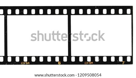 real high res photo scan of old 35mm film frame strip on white background with signs of usage and dust