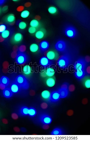 Christmas or New Year's card, lights round multi-colored in blur