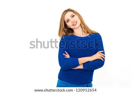 Beautiful and happy woman, against a white wall with copyspace
