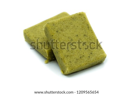 Vegetable stock cubes isolated on white background
