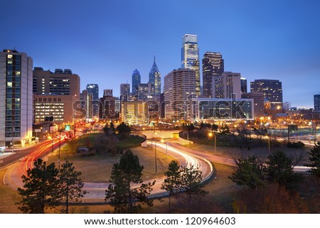 Philadelphia. Image of Philadelphia skyline and busy roads during twilight blue hour.