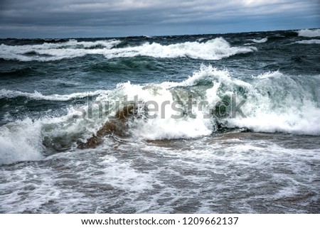 Big Waves at Pictured Rocks Beach at a storm and windy day on the fall