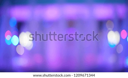 Defocused shot of purple fountain in urban setting for background compositing