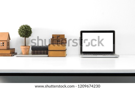 Mockup computer and office supply on desk and white background office.