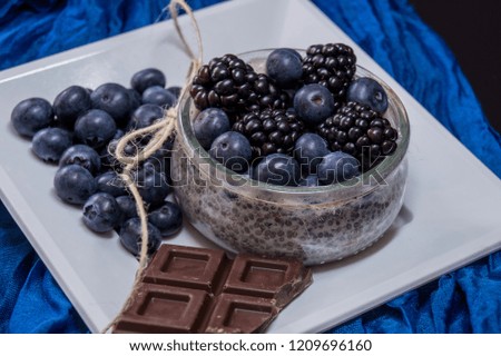 blueberries and chia pudding and chocolate