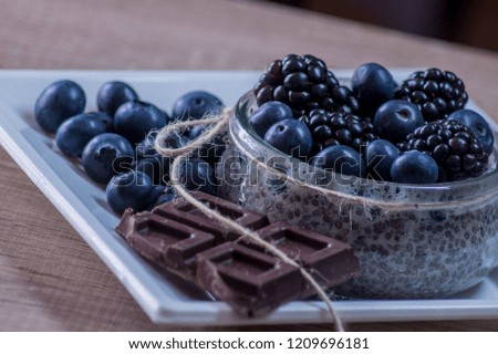 blueberries and chia pudding and chocolate