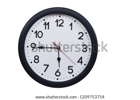 Time concept with black clock at a quarter to six Royalty-Free Stock Photo #1209753754