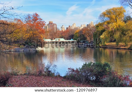 New York City Central Park in Autumn with lake and foliage.