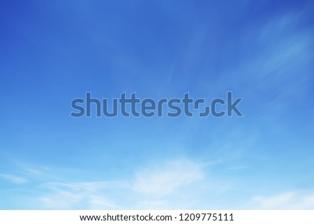 Cloud sky sunrise during morning background. Blue pastel heaven,soft focus lens flare sunlight. Abstract blurred white cyan gradient of peaceful nature. Open view windows beautiful summer spring Royalty-Free Stock Photo #1209775111