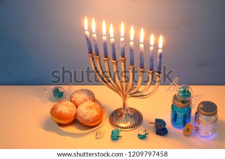 image of jewish holiday Hanukkah background with menorah (traditional candelabra)