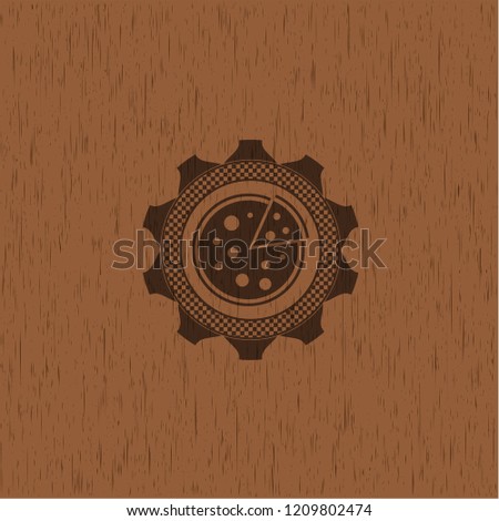 pizza icon inside wood badge or emblem