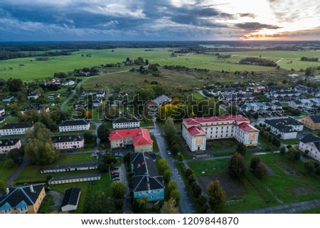 Aerial view of the city at sunset. Beautiful autumn city landscape. 