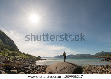 Lonely man at the wild coast, Northern Norway, Lofoten