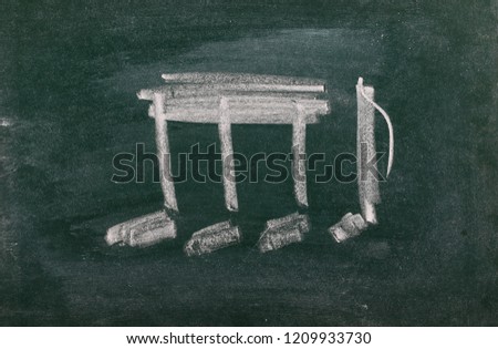 Musical note drawn on chalkboard, blackboard background, texture