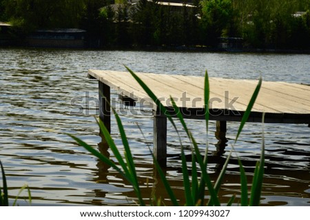 Wooden jetty on a beautiful lake