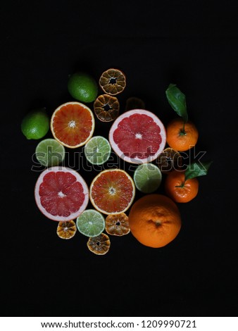Half fruit composition. Cut fruit disposed for a great composition, used for background, spot, website and many other use. Lime, lemon, orange, grapefruit and tangerine, excellent component for juices