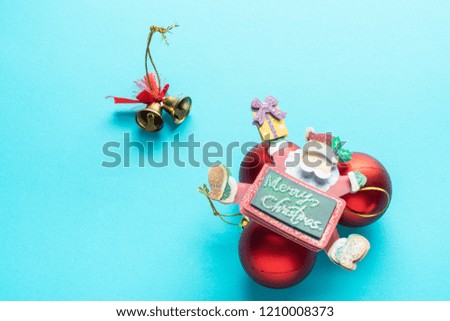 Christmas bells and Santa Claus with a Merry Christmas message a