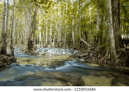 Nature landscape of beautiful deep forest waterfall in Thailand