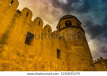 Photo of Mosque in Sousse. Medieval architecture of famous african city. Vivid picture of ancient religious building - one of the main attractions in Sousse, Tunisia.