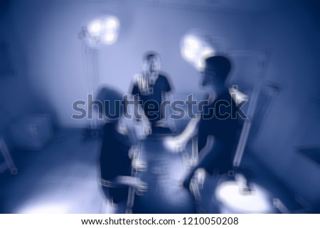 group of doctors operation blurred background / blurred background modern medical clinic doctors on surgery, surgeons at work