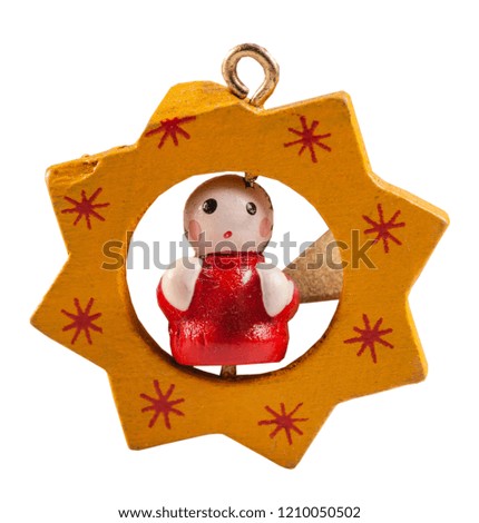 Small dolls decorated on Christmas tree white blackground