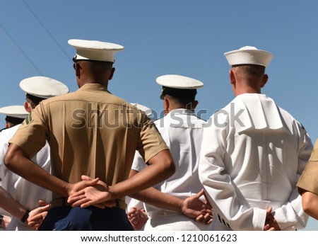 US Navy sailors from the back. US Navy army. Royalty-Free Stock Photo #1210061623