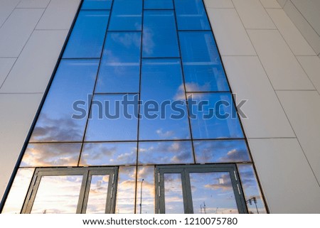 glass building at sunset