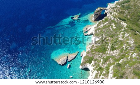 Aerial drone bird's eye view photo of tropical white rocky arch with turquoise clear waters in exotic caribbean destination