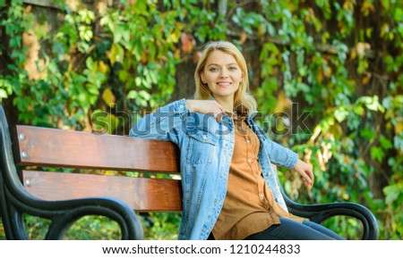 Ways to give yourself break and enjoy leisure. Girl sit bench relaxing fall nature background. Feeling free and relaxed. Woman blonde take break relaxing in park. You deserve break for relax.