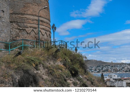 The ruined wall of ancient fortress citadel Narikala in the old city of Tbilisi in Georgia.