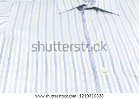 Close up of pink and white striped shirts. Business clothes isolated for background. Surface of casual or formal t shirt uniform for beauty and fashion concept. texture of plaid Mens for work outfit