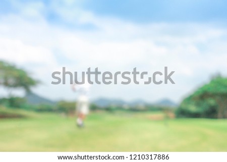blur photograpy golf player during hit golf ball at beautifull tropical golf course .Healthy exercise golf game concept.