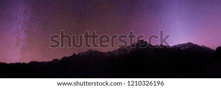 This image is of Indrahar Mountains situated at Himachal Pradesh state of India. We can see the galectic centre/milky way behind them.