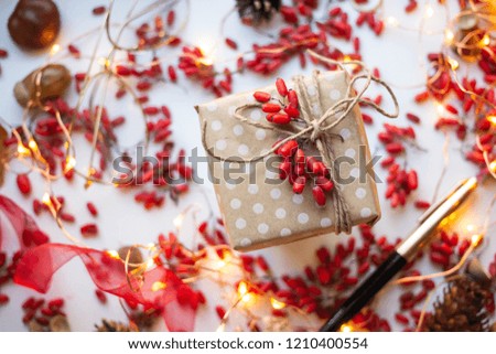 modern gift wrapping. doted craft gift. present box with copy place and ribbon with barberry