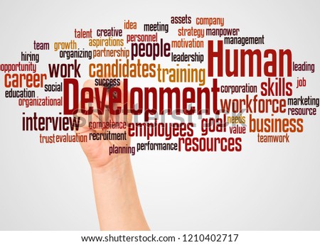 Human Development word cloud and hand with marker concept on white background.