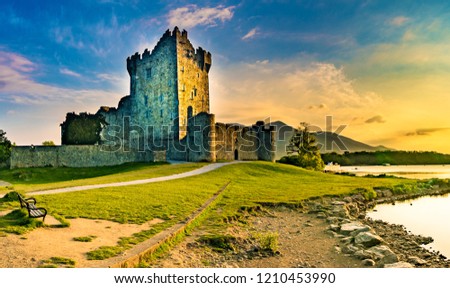 Ross Castle in Killarney at sunset, Ireland Royalty-Free Stock Photo #1210453990