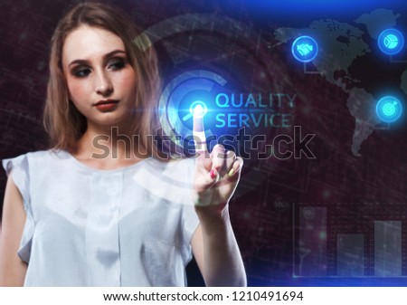 The concept of business, technology, the Internet and the network. A young entrepreneur working on a virtual screen of the future and sees the inscription: Quality service