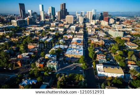 Denver Colorado Downtown Skyline aerial drone view of long perspective streets and roads in historic neighborhood in the Mile High City of Denver , Colorado