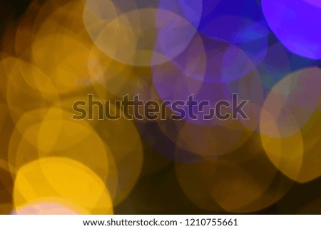 Beautiful bokeh lights, blurry abstract background.
