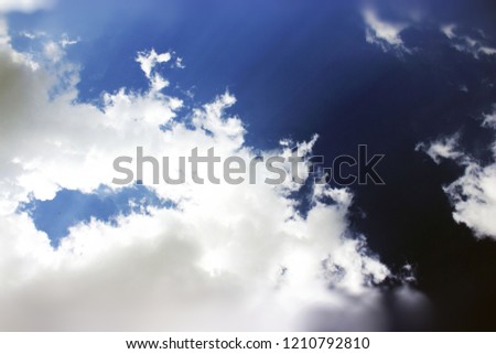 white clouds on a blue background