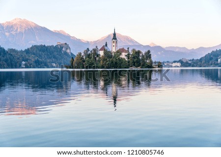 Still Lake Bled in Slovenia with Church on an Island at Sunset