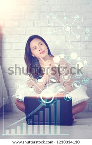 Asian young beautiful woman using laptop in the room for online shopping on icon technology.shopping online concept.