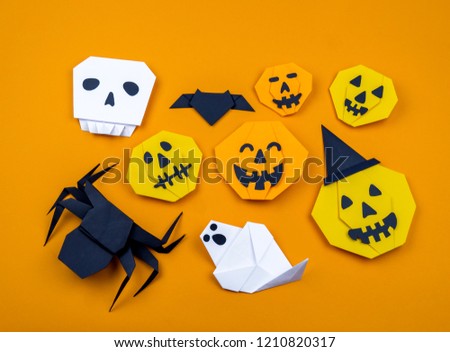 Origami Halloween. Bat, ghost, pumpkin, paper. Copy spase. Creativity children kindergarten