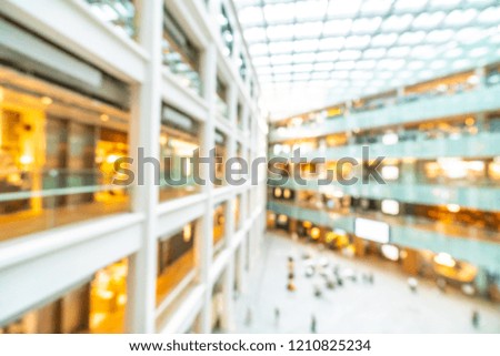 Abstract blur and defocused shopping mall of department store interior for background